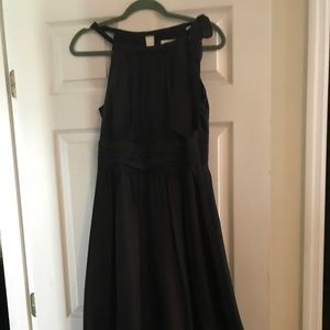 Absolutely beautiful black dress. Name Brand